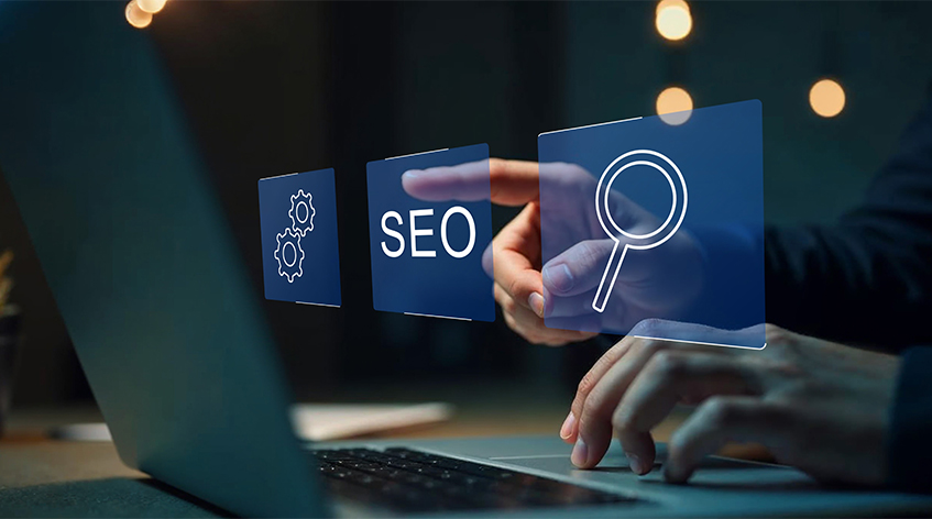 A Person At A Laptop Interacting With Floating Digital Icons Representing SEO